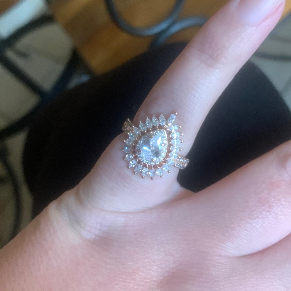 Diamond Cubic Zirconia, rose gold plating, size 6.